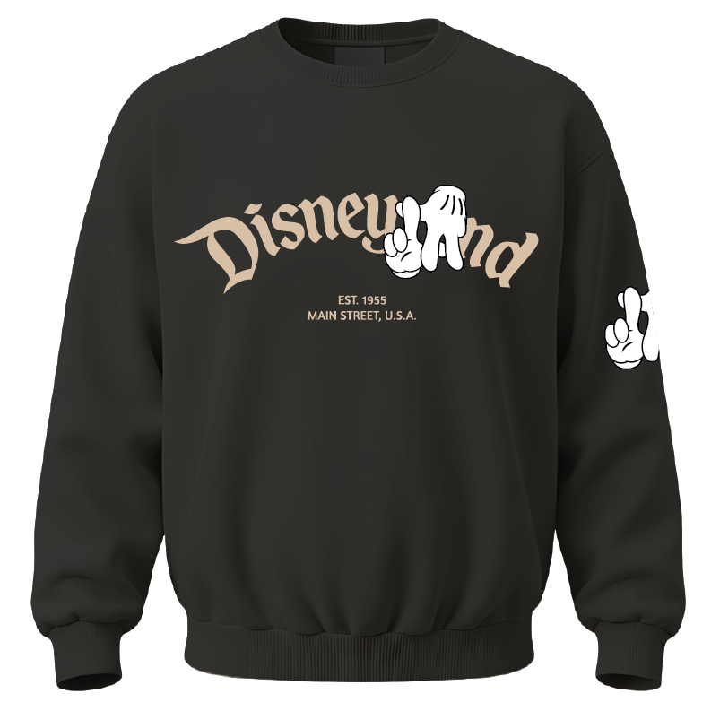 A black crewneck sweatshirt featuring a beige and white graphic print on the front that reads 'Disneyland' with a Mickey Mouse silhouette