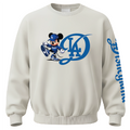 An off-white crewneck sweatshirt featuring a blue and white Los Angeles Dodgers Mickey Mouse graphic on the chest, with blue script text printed down the right sleeve.