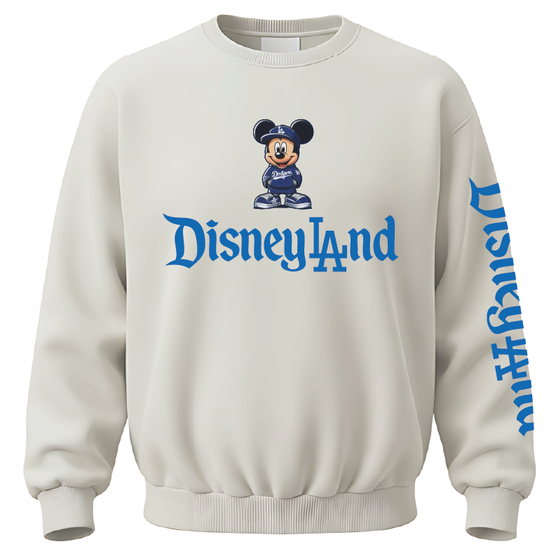 An off-white crewneck sweatshirt featuring a blue and white Mickey Mouse Dodgers graphic above the text 'Disneyland' on the chest, with 'Disneyland' printed vertically in blue on the right sleeve.