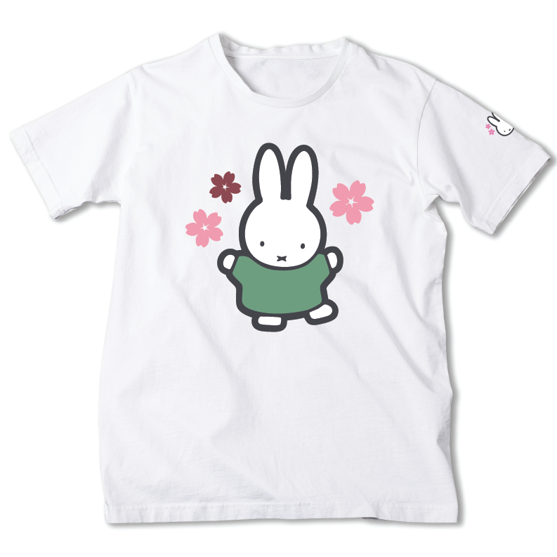 A white short-sleeve crewneck t-shirt featuring a cartoon graphic of a white bunny wearing a green shirt, surrounded by pink and burgundy flowers. A small matching bunny graphic is printed on the left sleeve.