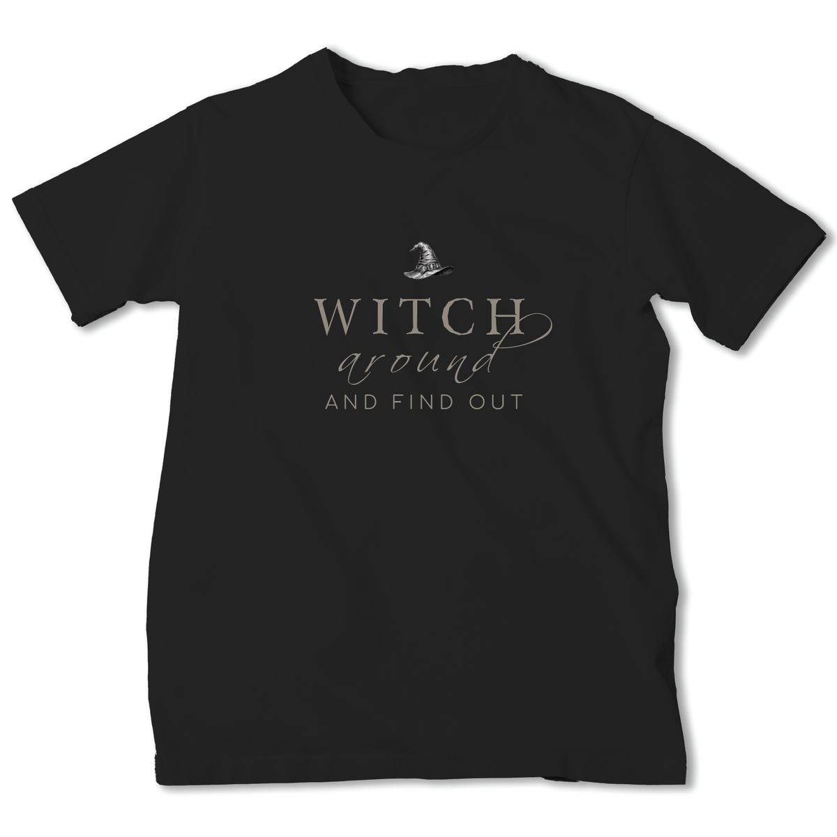 A black short-sleeve crewneck t-shirt with a graphic on the chest that reads 'WITCH around AND FIND OUT' in a light beige or champagne-colored font, accompanied by a small witch hat illustration above the text.